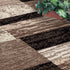 12' Black Brown And Beige Patchwork Runner Rug